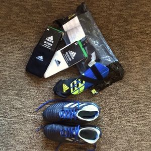 Soccer Gear: gently used cleats, NEW socks, and NEW shin guards.